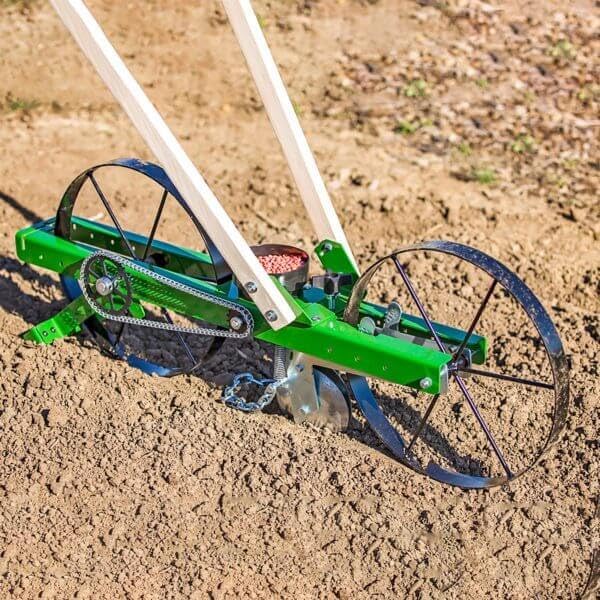 Walk-Behind Row Seeders from $100 to $565: Hoss, Chapin, Varomorus, and the Agri-Fab Compared on Spacing Accuracy